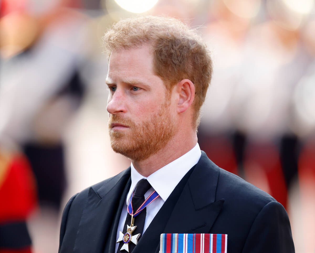 closeup of Prince Harry frowning