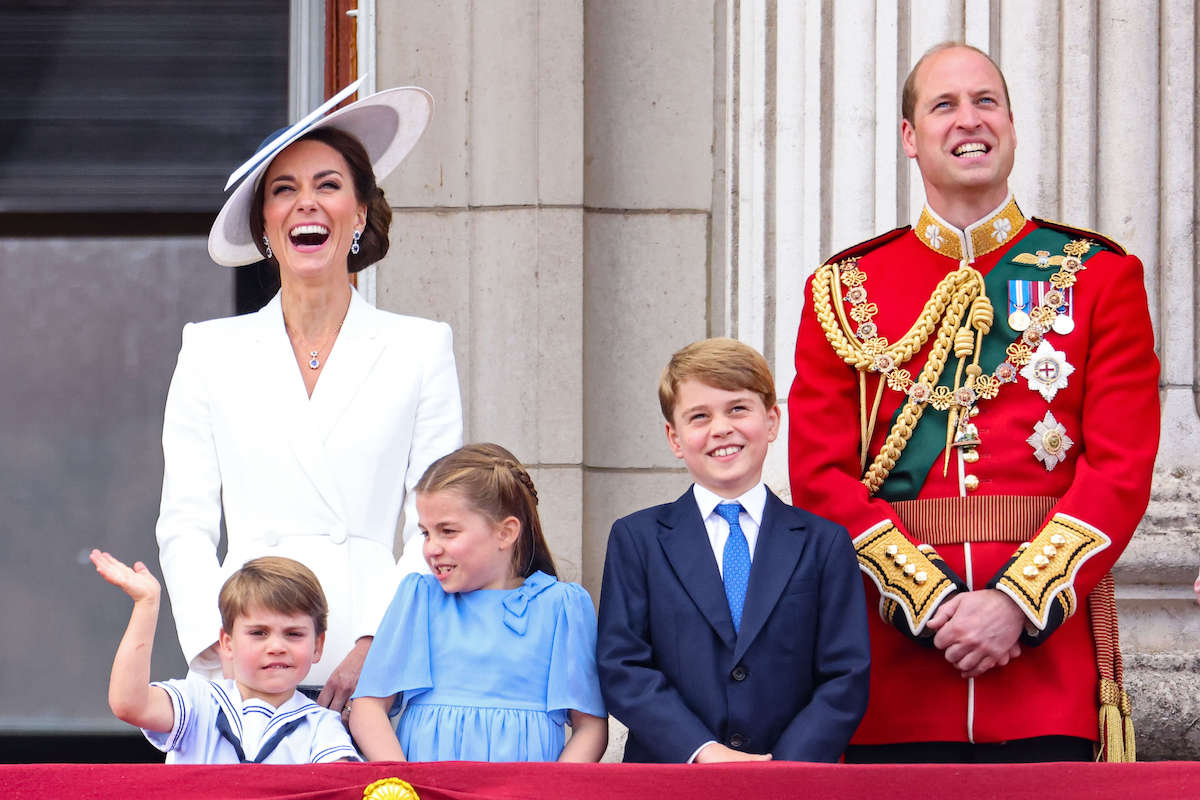 Kate Middleton, who, according to a book, doesn't bring her children 'down to earth,' stands with Prince William, Prince George, Princess Charlotte, and Prince Louis.