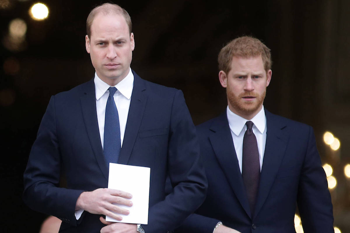 Prince William, who Prince Harry received a text from in a 'Harry & Meghan' scene, walks ahead of Prince Harry