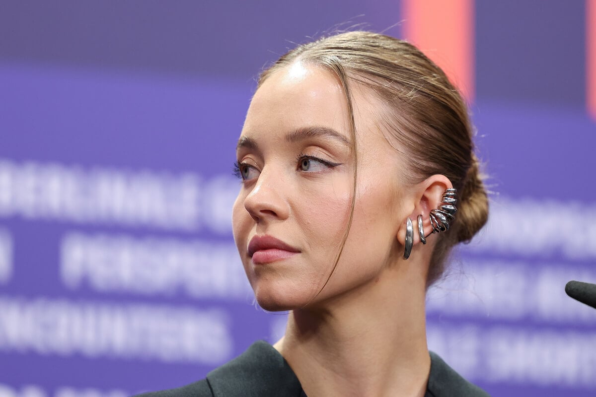 Sydney Sweeney wears black to a press conference for 'Reality'