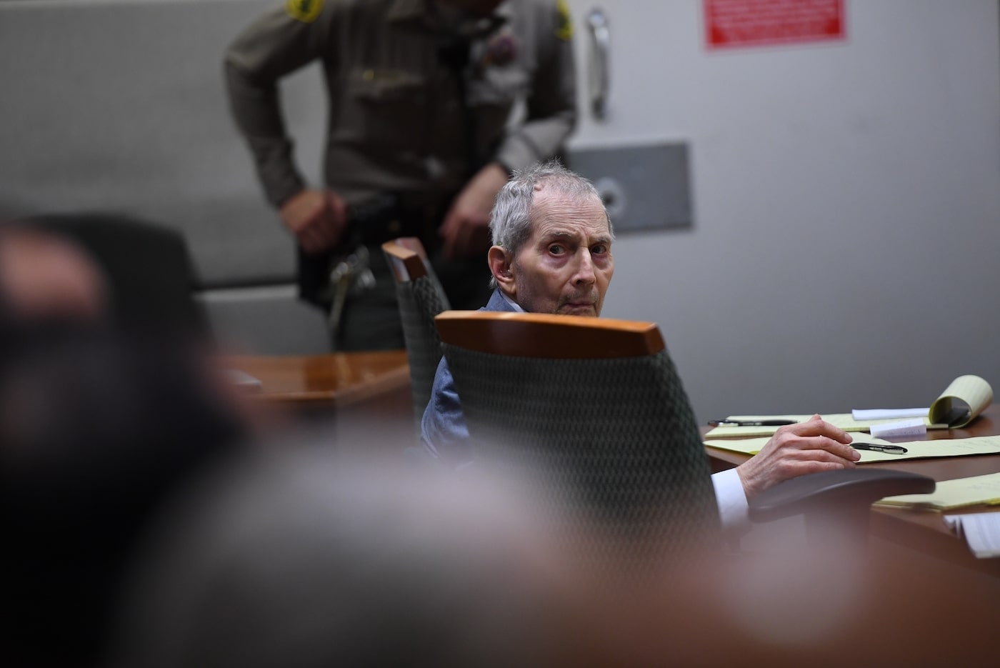 Robert Durst appears in court and looks behind him
