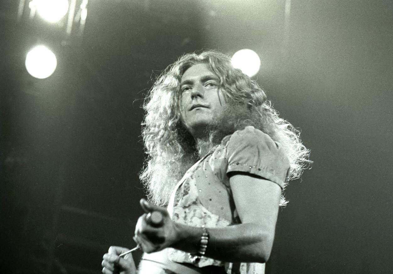 Led Zeppelin singer Robert Plant holds the microphone as he performs with the band in June 1972.
