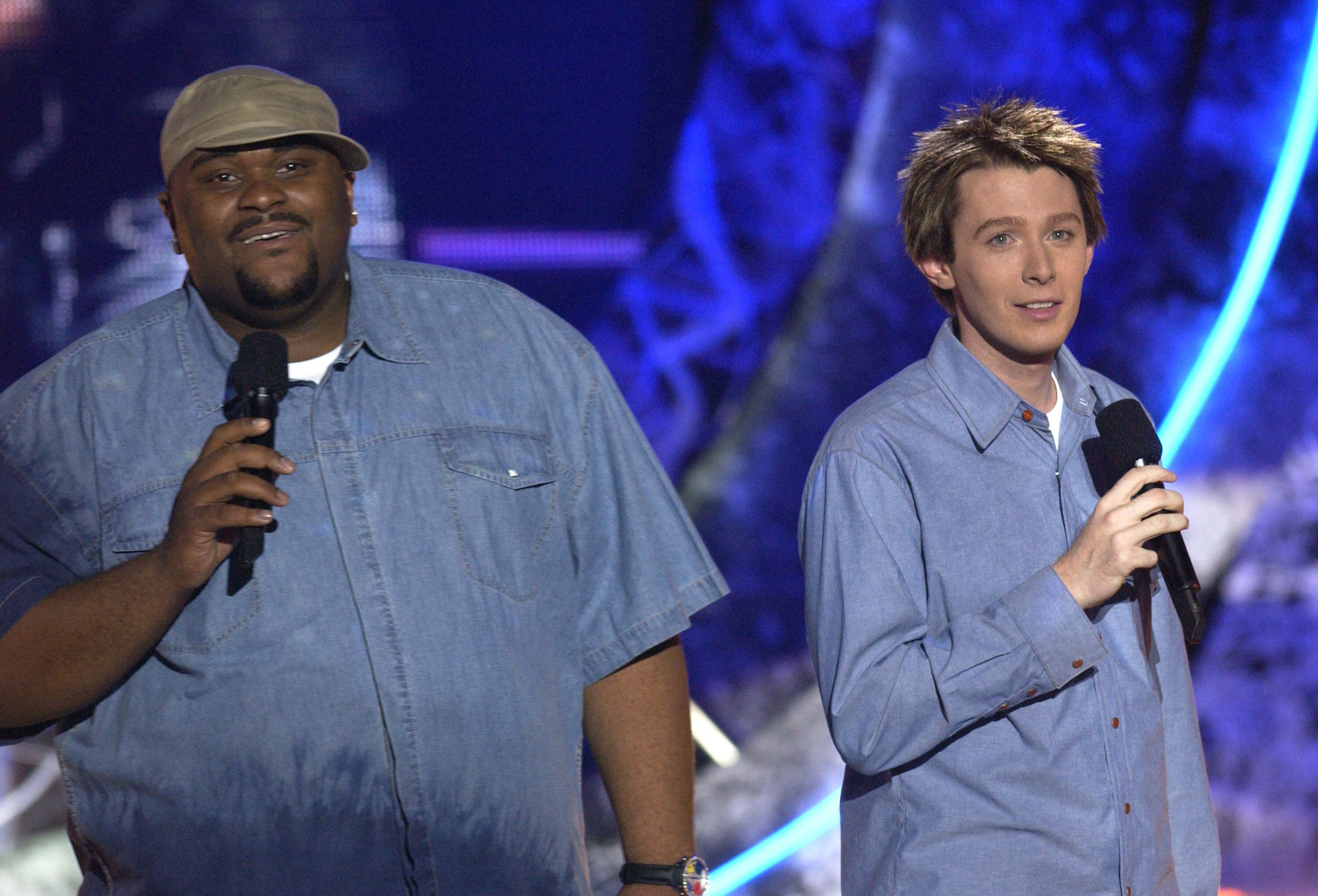 Ruben Studdard and Clay Aiken perform in denim shirts