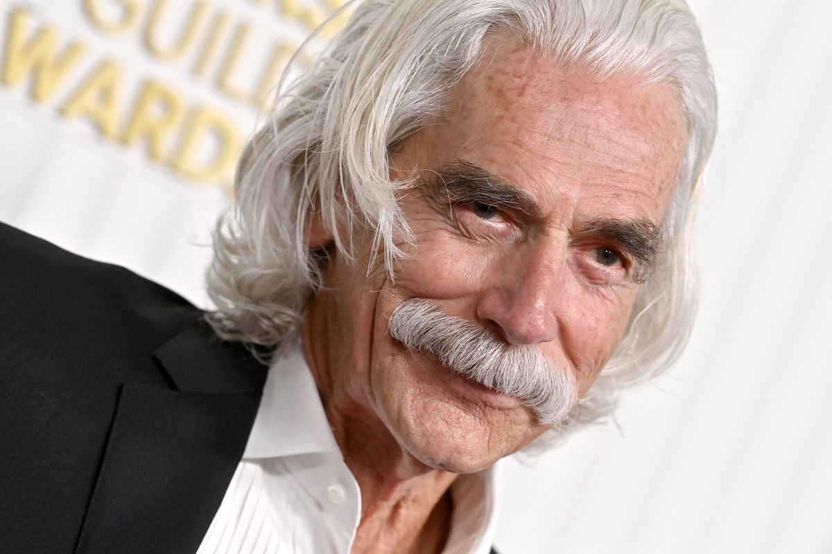 Sam Elliott poses for photos at the SAG awards.