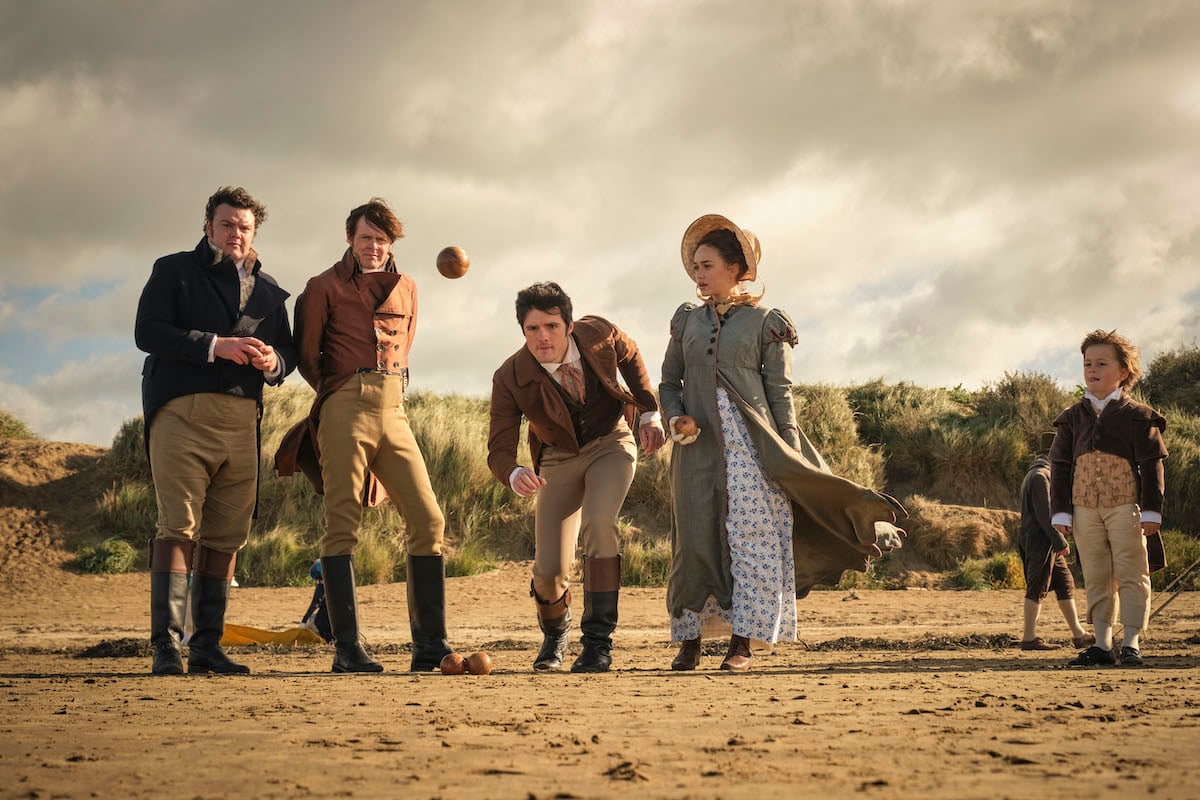 A group of people standing on the beach in 'Sanditon' Season 3