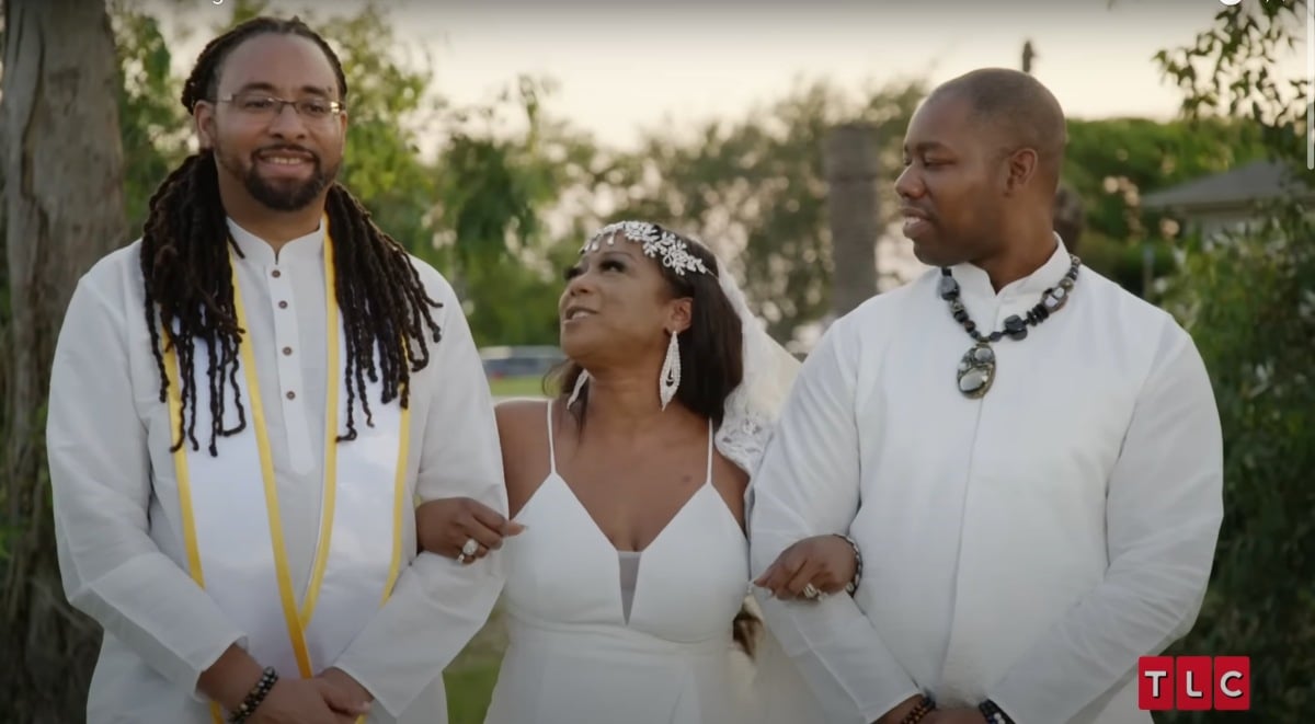 Kenya, Carl and Tiger pose together on their wedding day on 'Seeking Brother Husband' Season 1 on TLC.