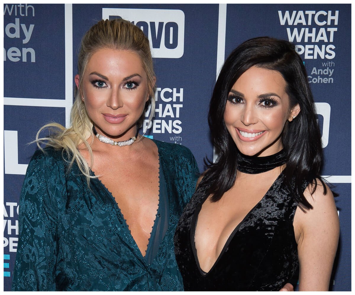 "Vanderpump Rules" stars Stassi Schroeder and Scheana Shay smile and pose together at an event.