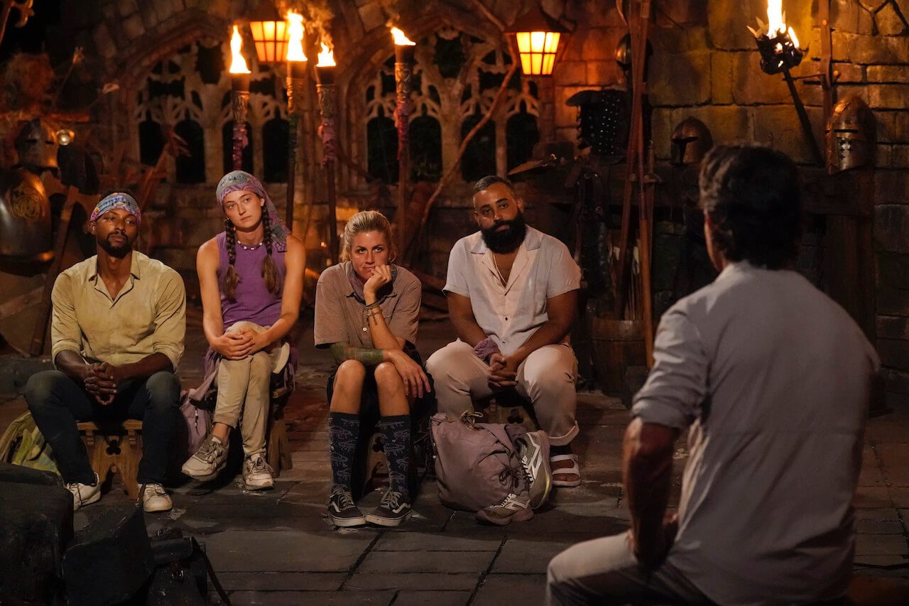 Josh Wilder, Sarah Wade, Carolyn Wiger, Yamil "Yam Yam" Arocho sit facing Jeff Probst at Tribal Council on 'Survivor 44'.