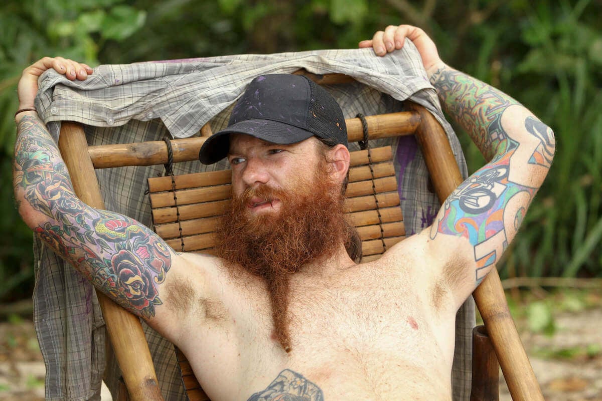 'Survivor' player Matt Bischoff sitting on the beach in Caramoan