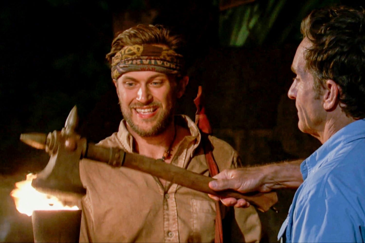Jeff Probst extinguishes Nick Wilson's torch at Tribal Council in 'Survivor: Winners at War.'