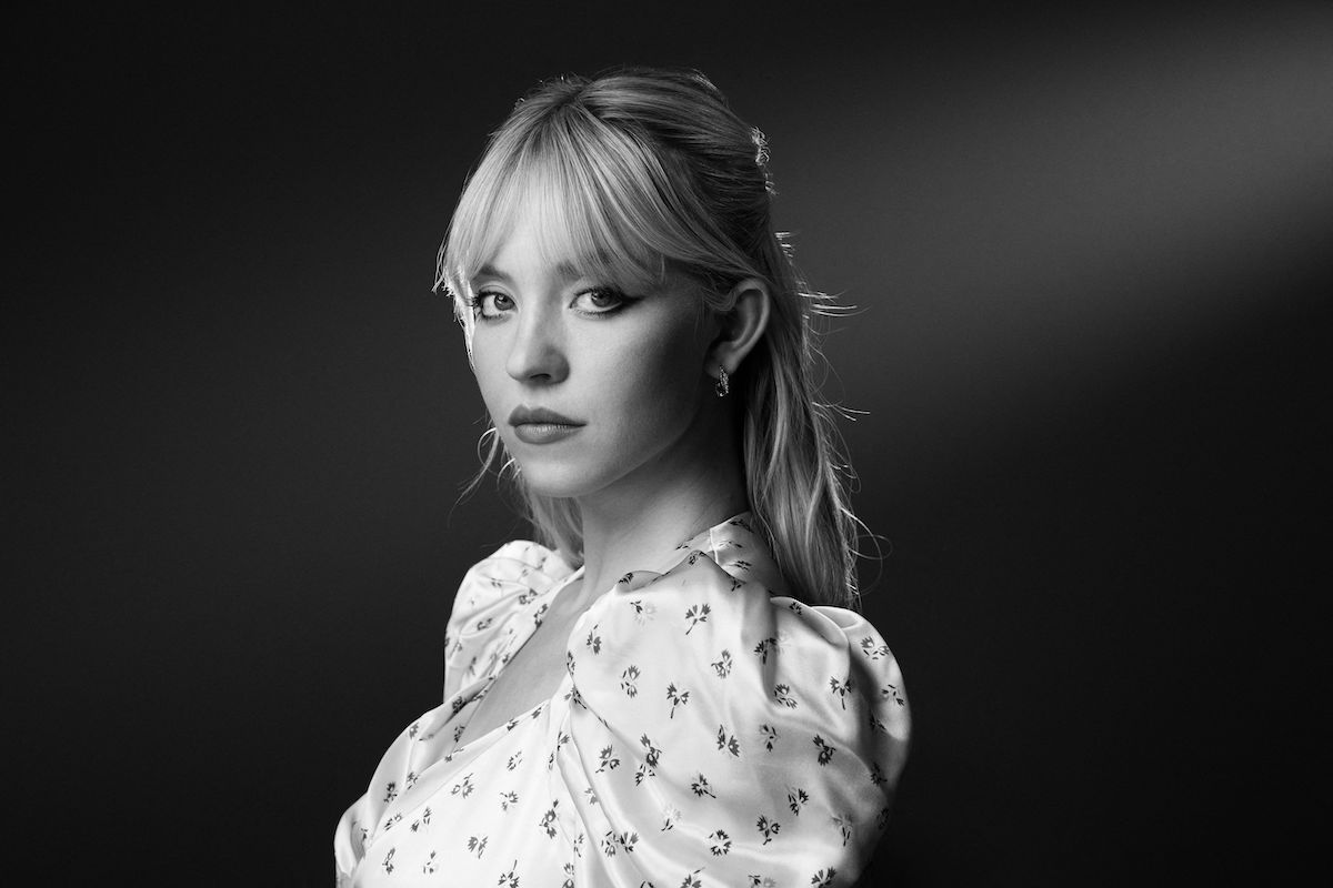 Sydney Sweeney, lover of vintage cars, poses for a portrait