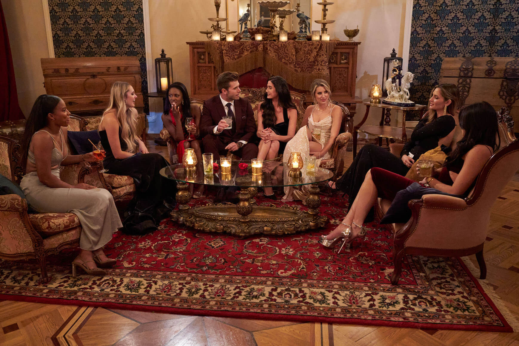 'The Bachelor' Season 27 cast sitting on couches with Zach Shallcross and talking to him
