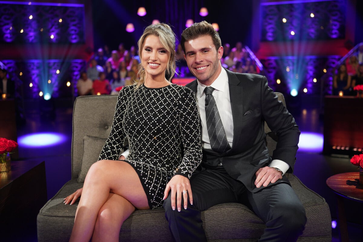 During The Bachelor After the Final Rose special, Zach Shallcross and Kaity Biggar pose for a photo in the Hot Seat.