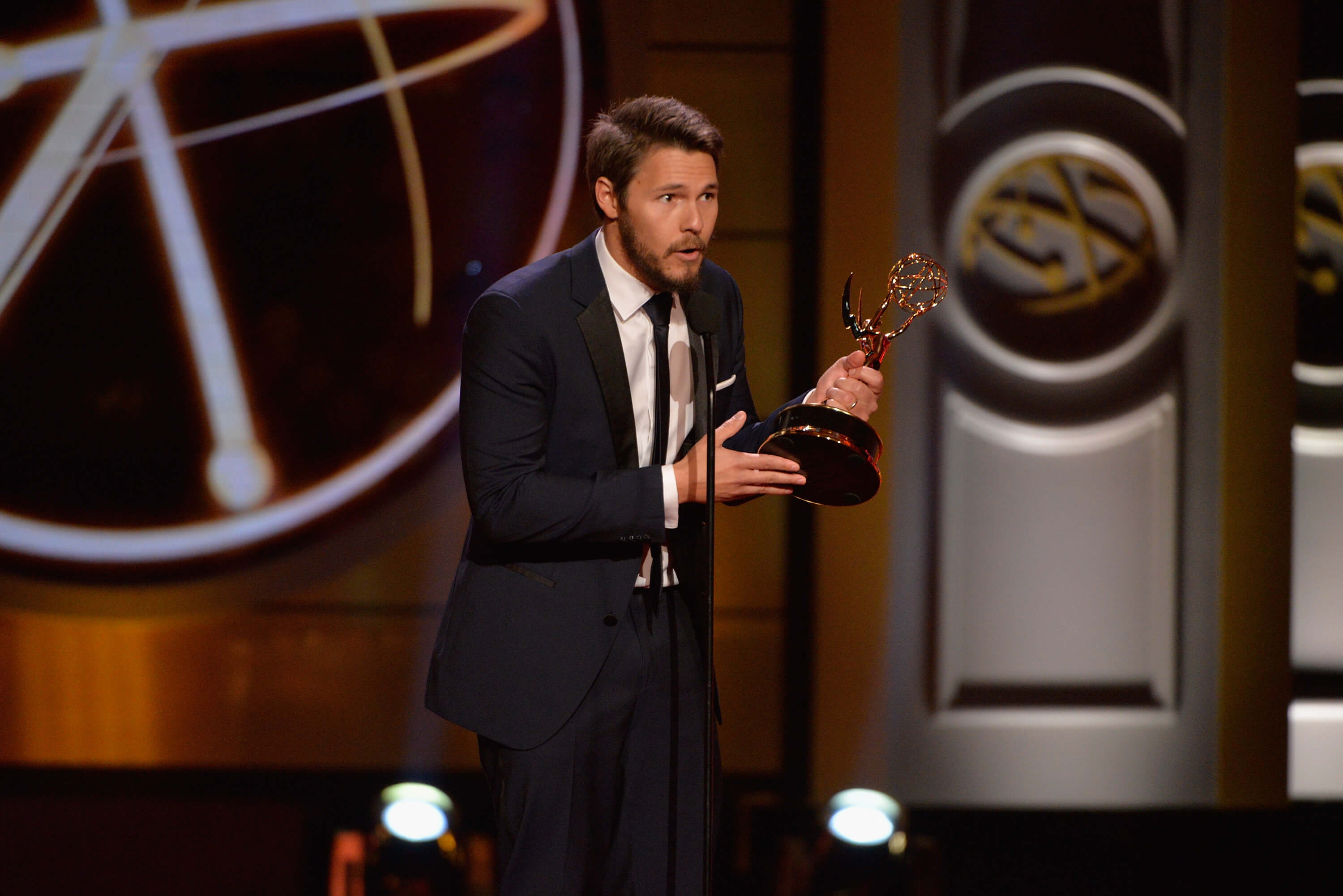 'The Bold and the Beautiful' star Scott Clifton dressed in a tuxedo; giving an acceptance speech after his Daytime Emmy win.