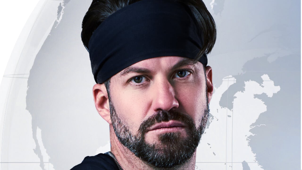 Johnny Bananas Devenanzio posing for 'The Challenge: World Championship' cast photo