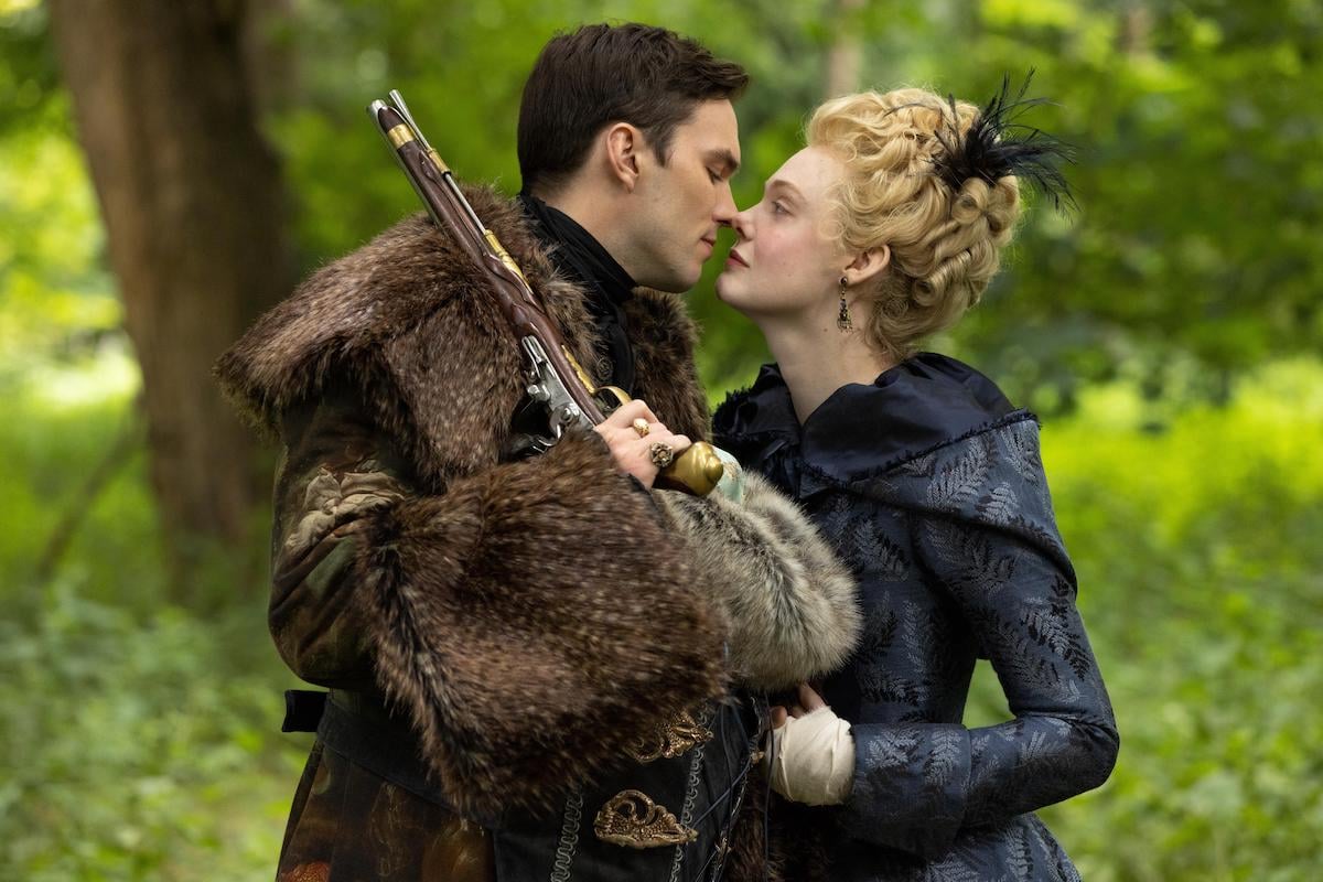 Nicholas Hoult and Elle Fanning leaning in to kiss in 'The Great' Season 3 Episode 1 on Hulu