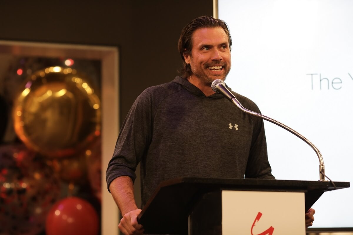 'The Young and the Restless' star Joshua Morrow speaking into a microphone during an on-set celebration.