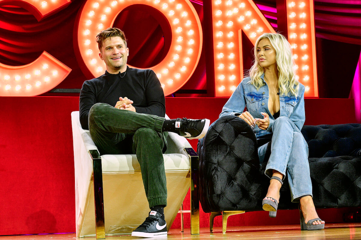 "Vanderpump Rules" stars Tom Schwartz and Lala Kent sit next to each other on stage at Bravo Con.