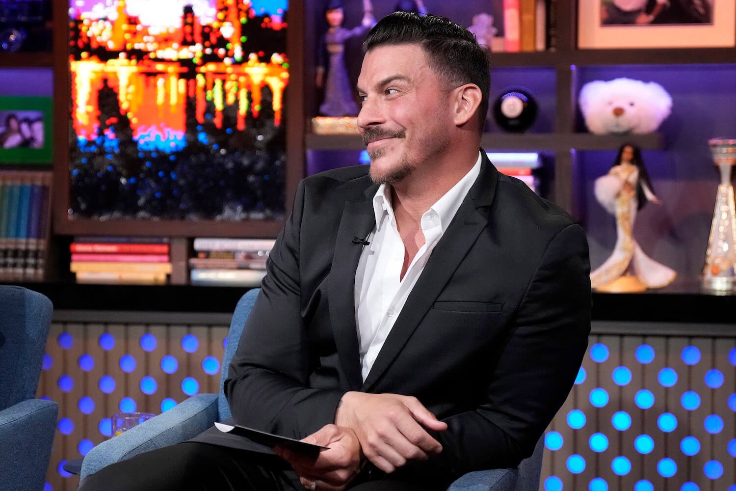 Former 'Vanderpump Rules' star Jax Taylor talked about Tom Sandoval during 'Watch What Happens Live.' Jax is seen here wearing a white button down and black jacket on the set of 'Watch What Happens Live.'