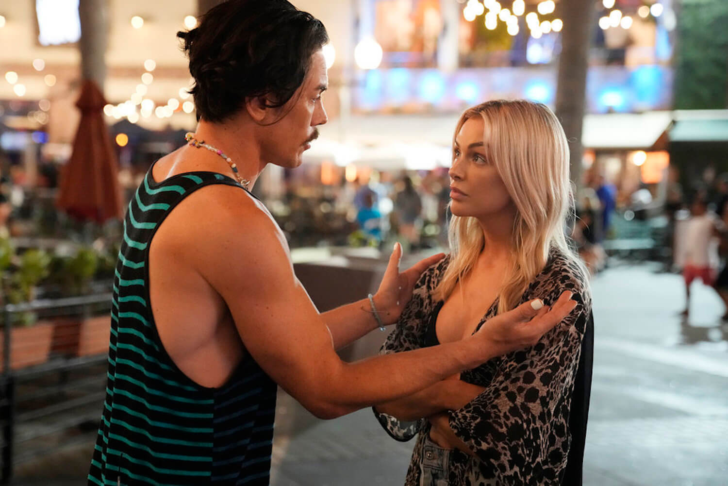 'Vanderpump Rules' stars Tom Sandoval and Lala Kent having a serious discussion in a production still from season 10. A new teaser for 'Vanderpump Rules' shows Lala become suspicious of Raquel in Vegas.