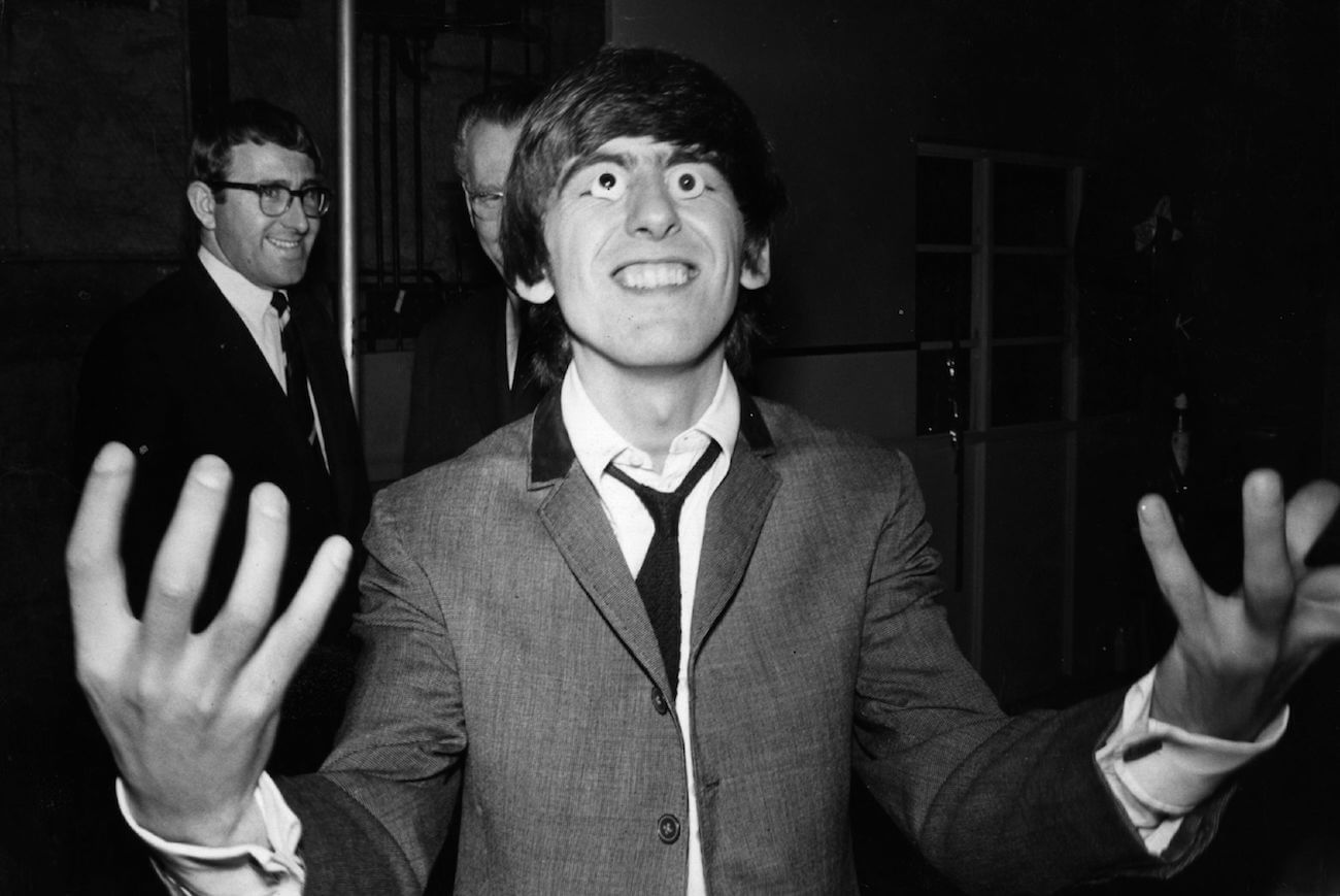 George Harrison being weird in 1964.