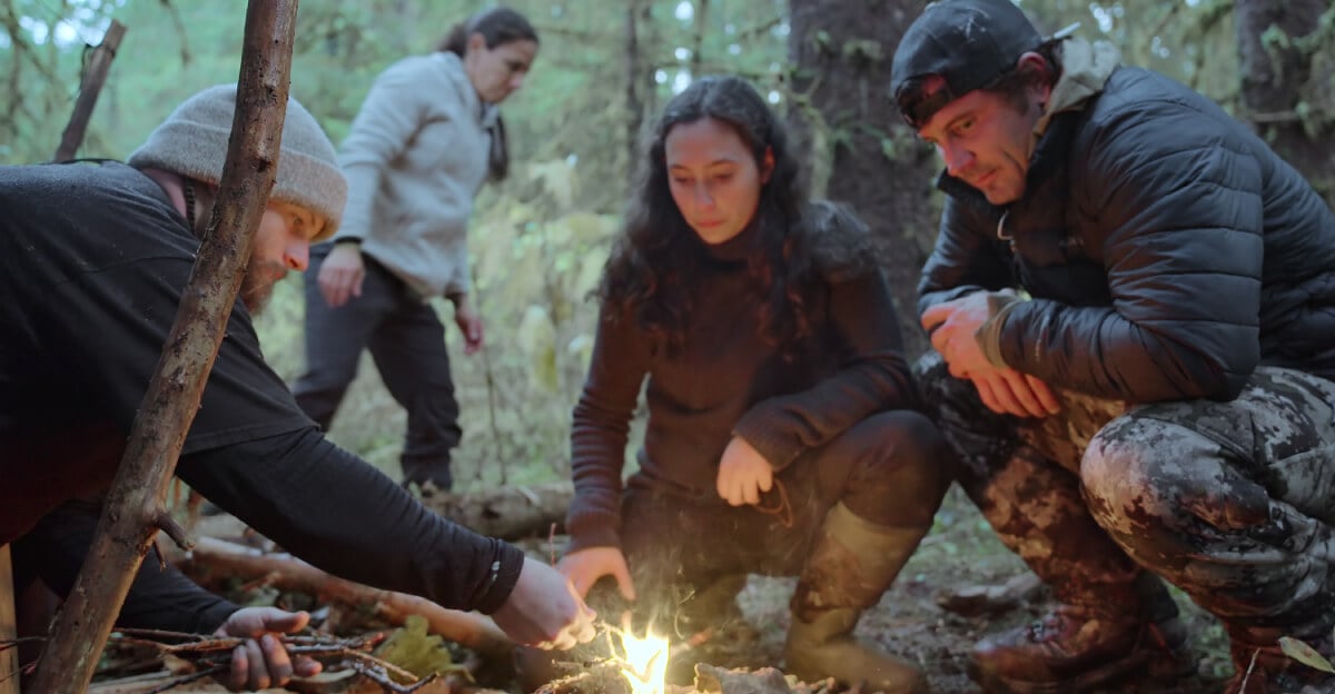In the Netflix series Outcast, Seth, Angie, and Nick stoke a fire at Charlie Camp.