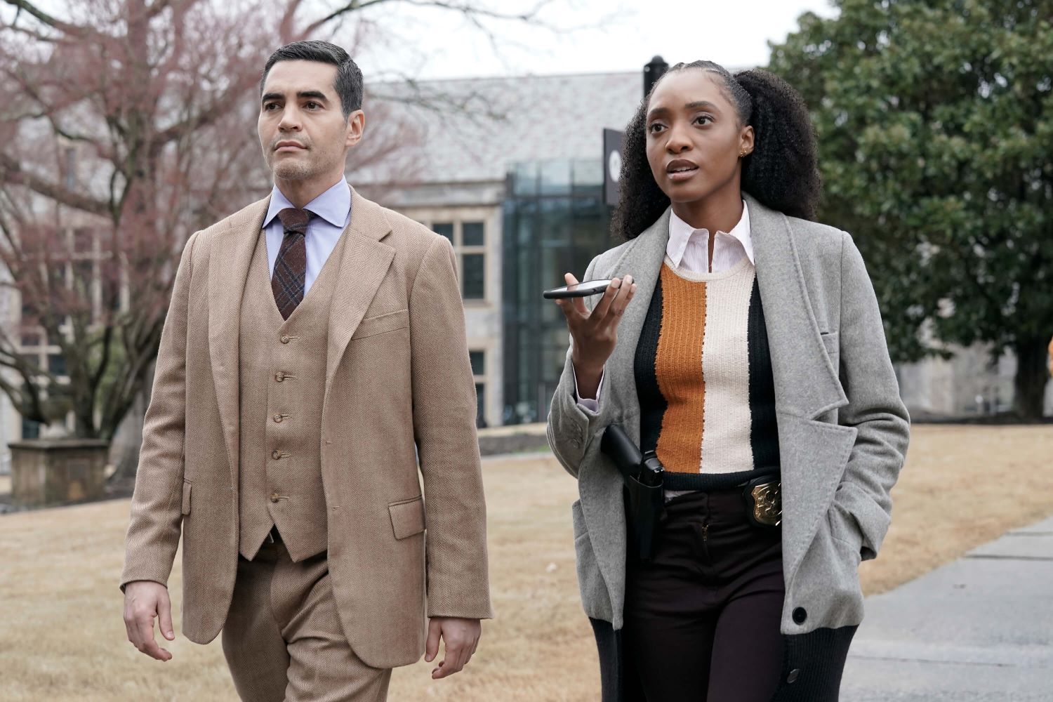 Ramón Rodríguez and Iantha Richardson star as Will Trent and Faith Mitchell in all episodes of 'Will Trent' on ABC. Will wears a tan three-piece suit