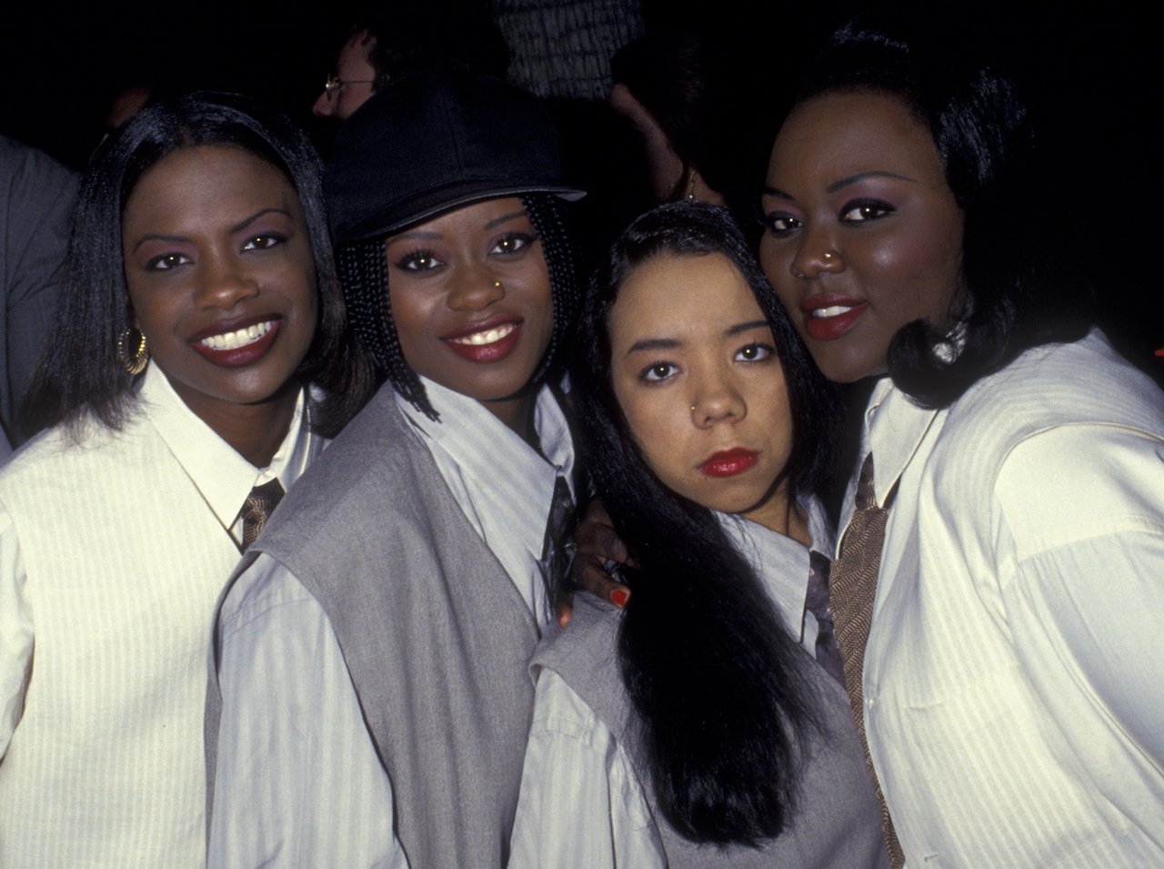 XSCAPE poses together during event. Kandi Burruss says the group's split forced her to think of other business ventures.