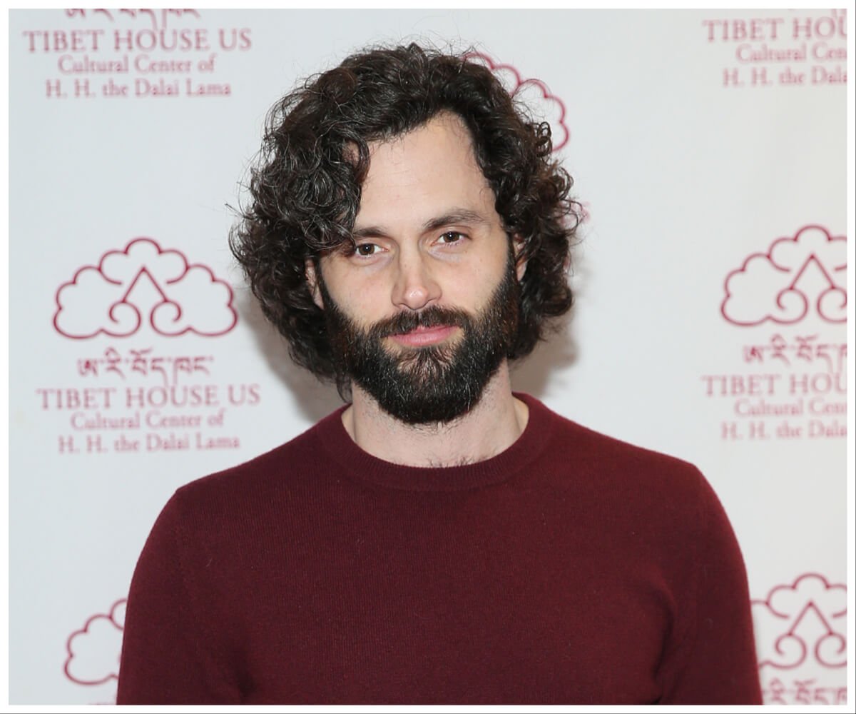 Actor Penn Badgley, who plays Joe Goldberg in "You," poses at an event.