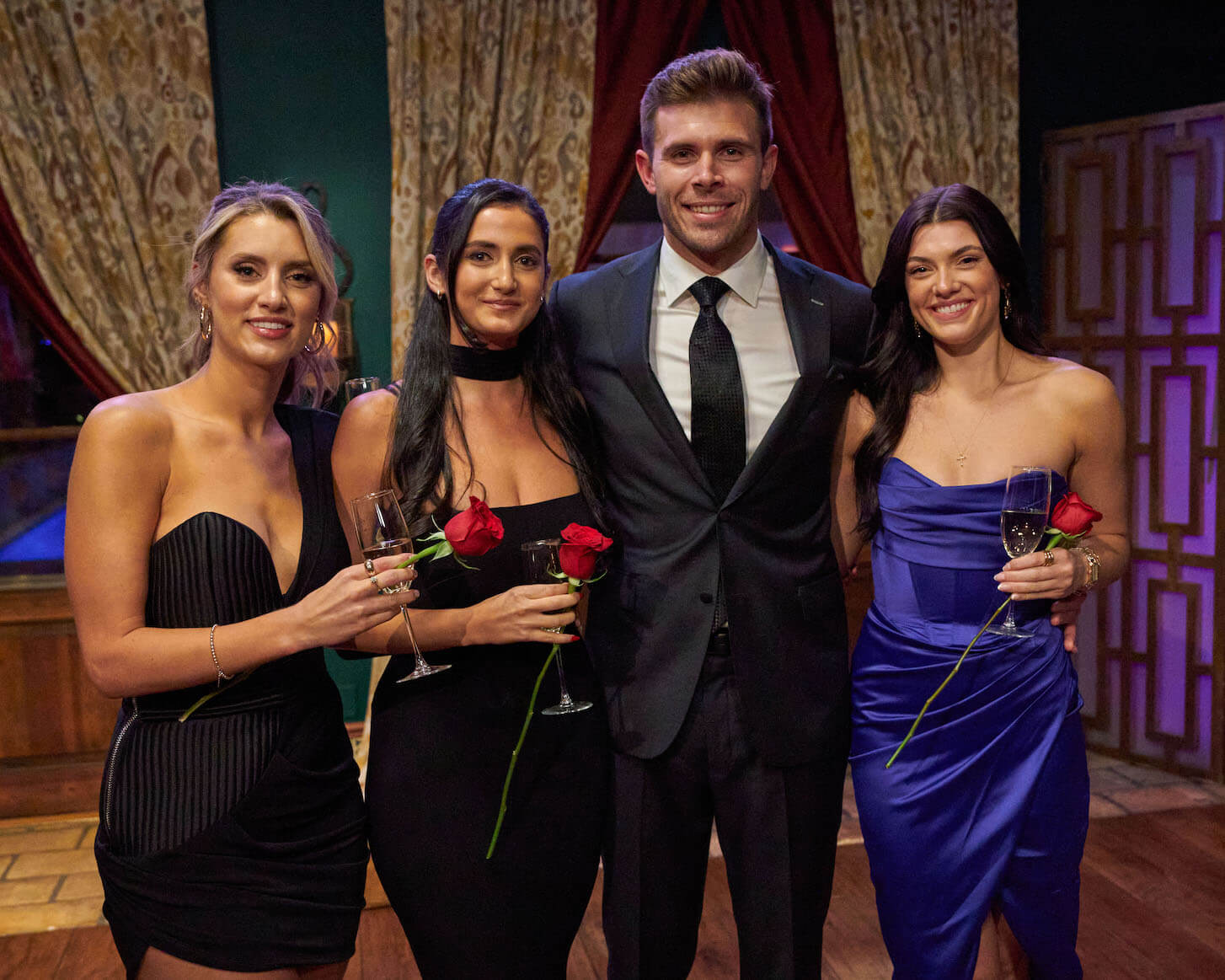 Kaity Biggar, Ariel Frenkel, Zach Shallcross, and Gabi Elnicki standing together. The 3 women head to 'The Bachelor' Season 27 Fantasy Suites