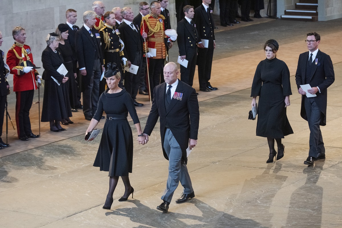 Zara Tindall, Mike Tindall, Princess Eugenie, and Jack Brooksbank leave the service for the reception of Queen Elizabeth II's coffin at Westminster Hall
