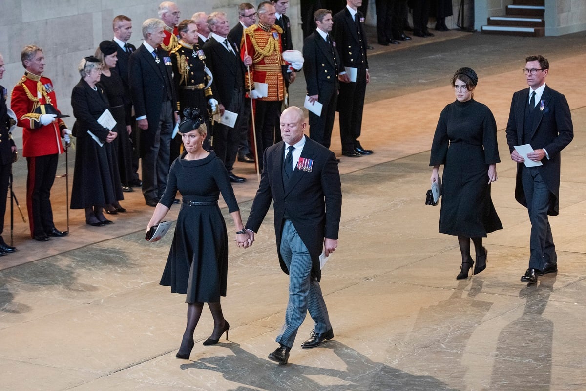 Zara Tindall, Mike Tindall, Princess Eugenie, and Jack Brooksbank leave the service for the reception of Queen Elizabeth II's coffin at Westminster Hall