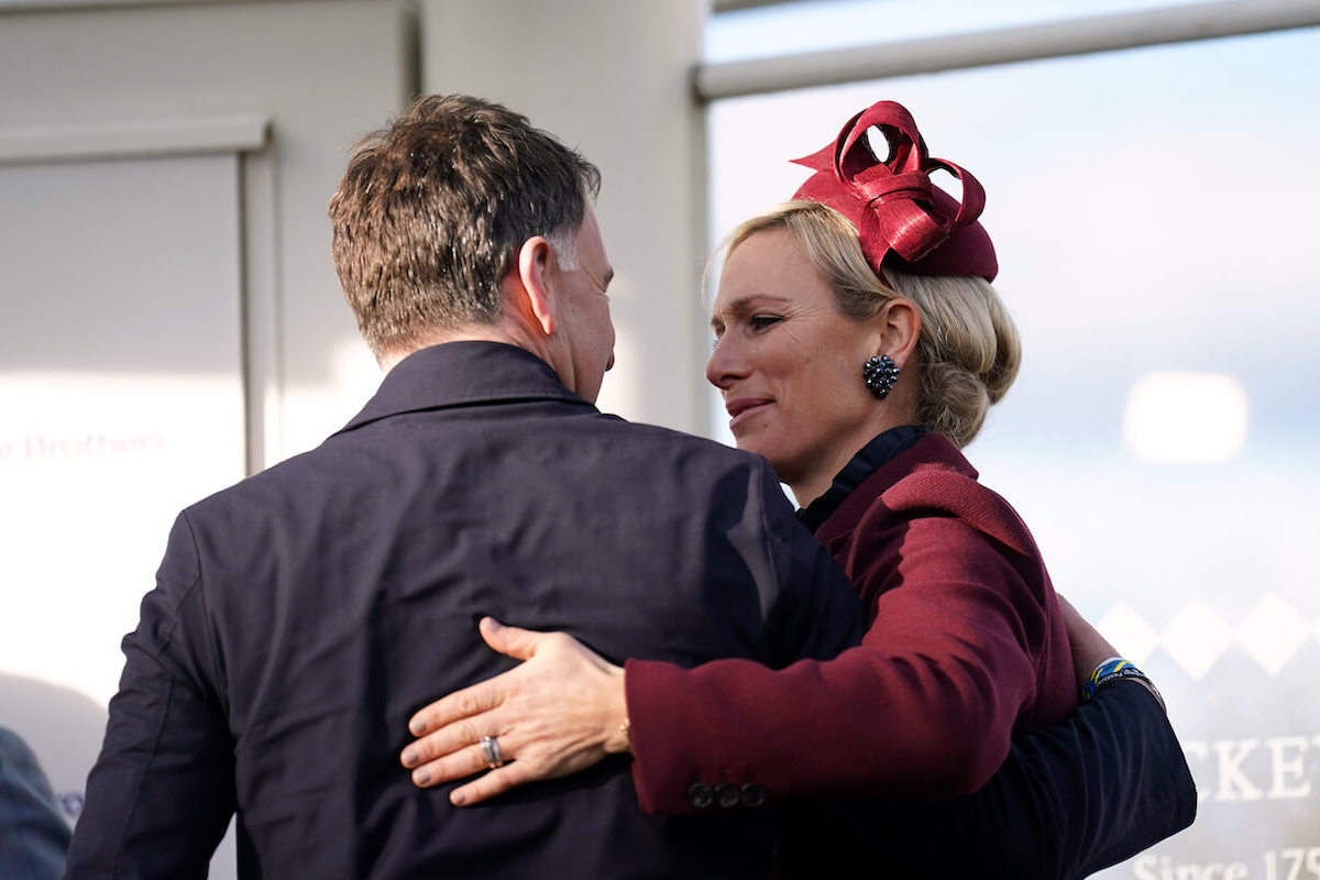 Zara Tindall, the British royal with the most 'tactile' body language, hugs trainer and friend, Henry de Bromhead, at the 2023 Cheltenham Festival
