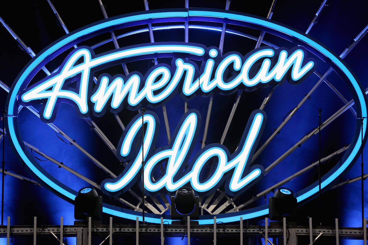 The American Idol logo in blue neon lights