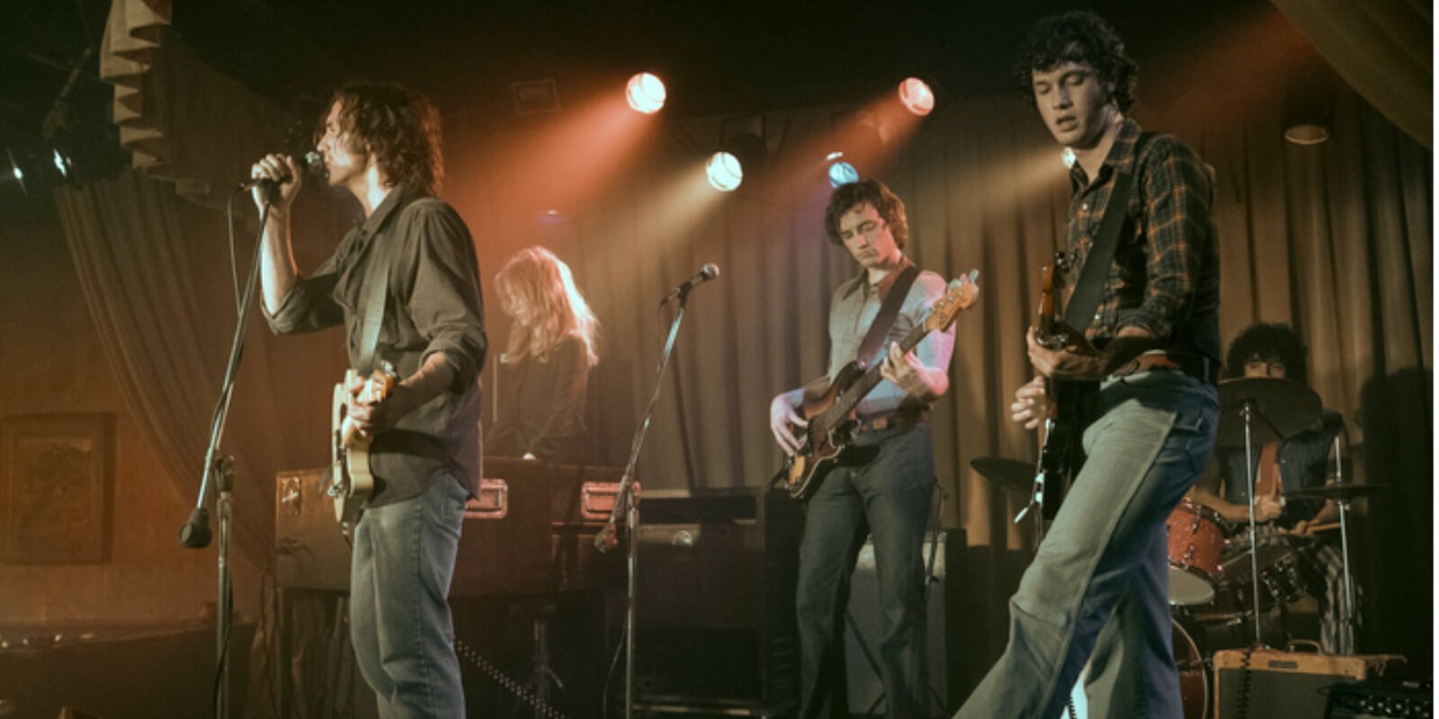 The band members of 'Daisy Jones & The Six' perform onstage at Filthy McNasty's bar in Los Angeles, California.