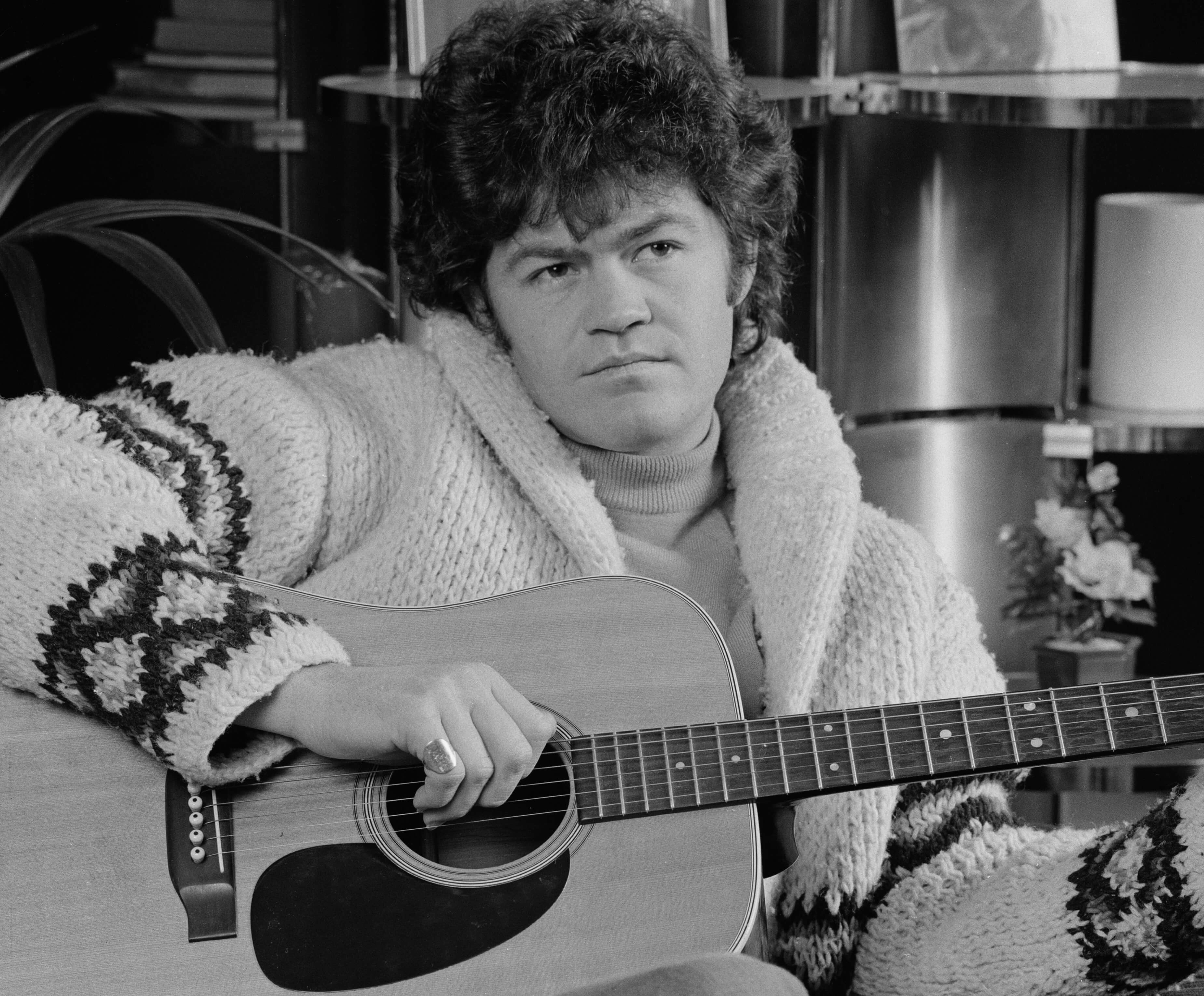 The Monkees' Micky Dolenz with a guitar