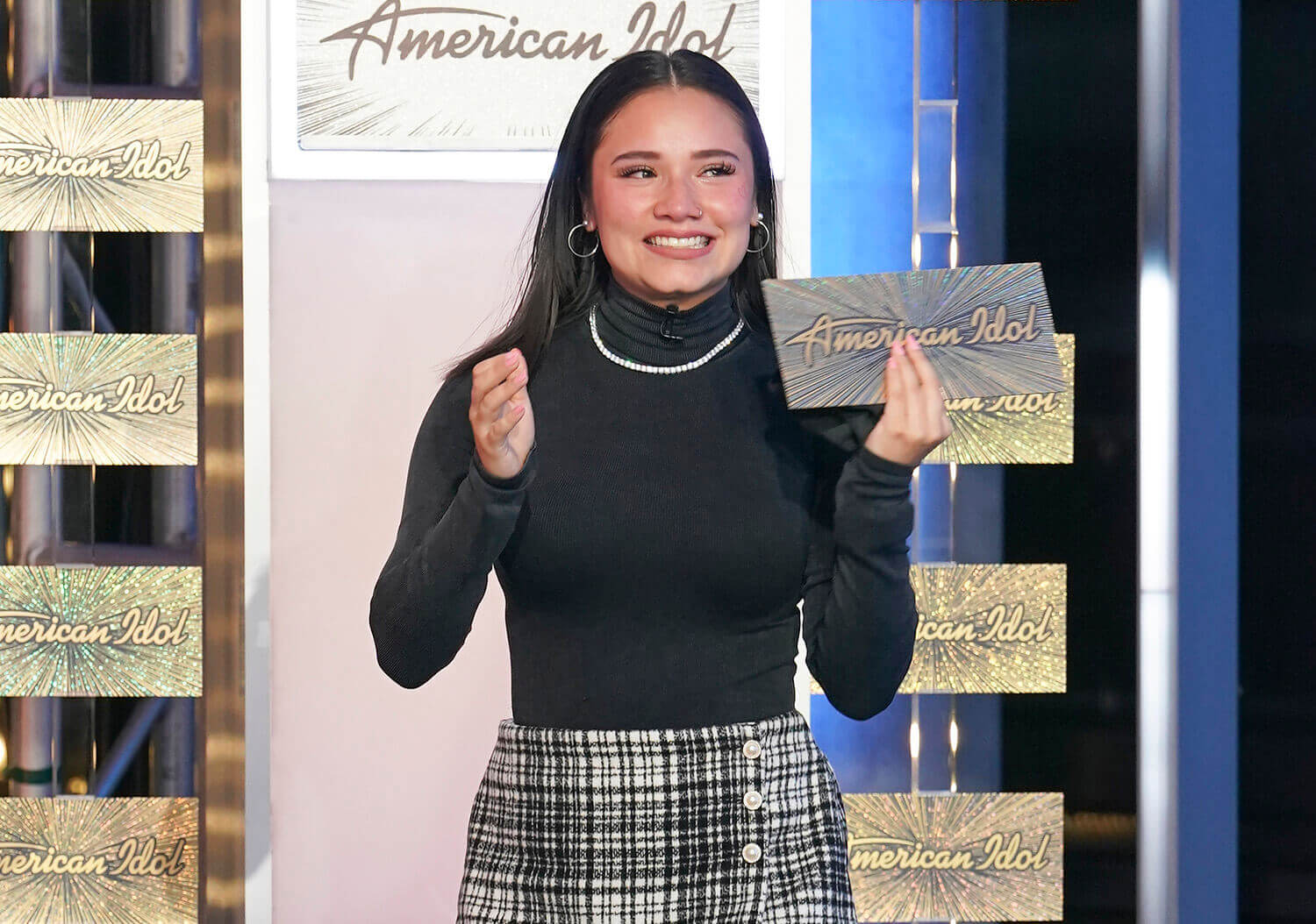 Fire Wilmore holds her golden ticket while crying after she got her second chance on American Idol