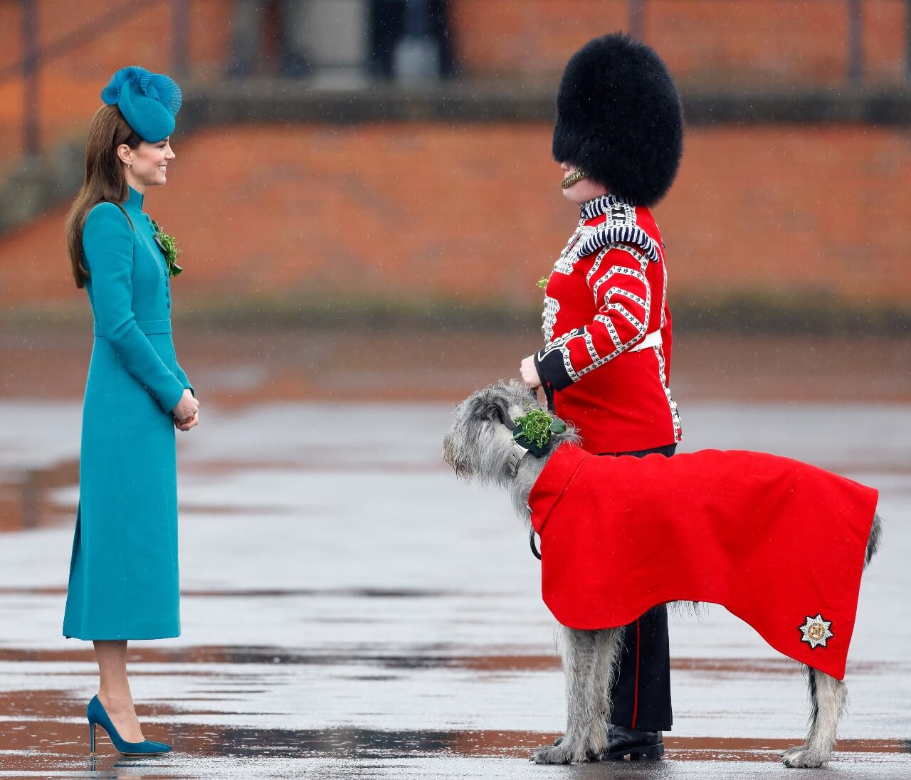 Kate Middleton celebrates St. Patrick's Day 2023 in her teal coat and shoes.