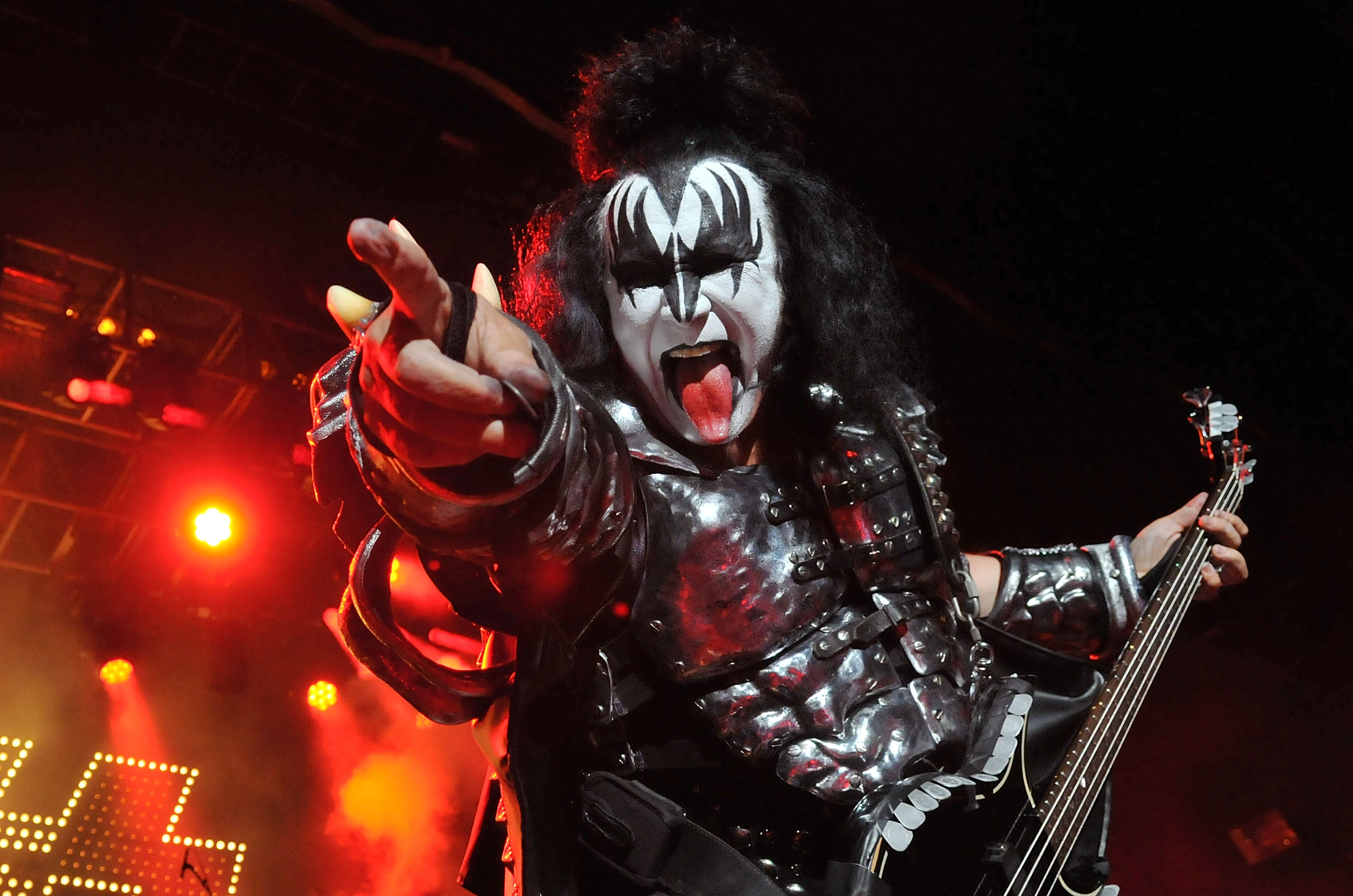 Kiss' Gene Simmons with a guitar