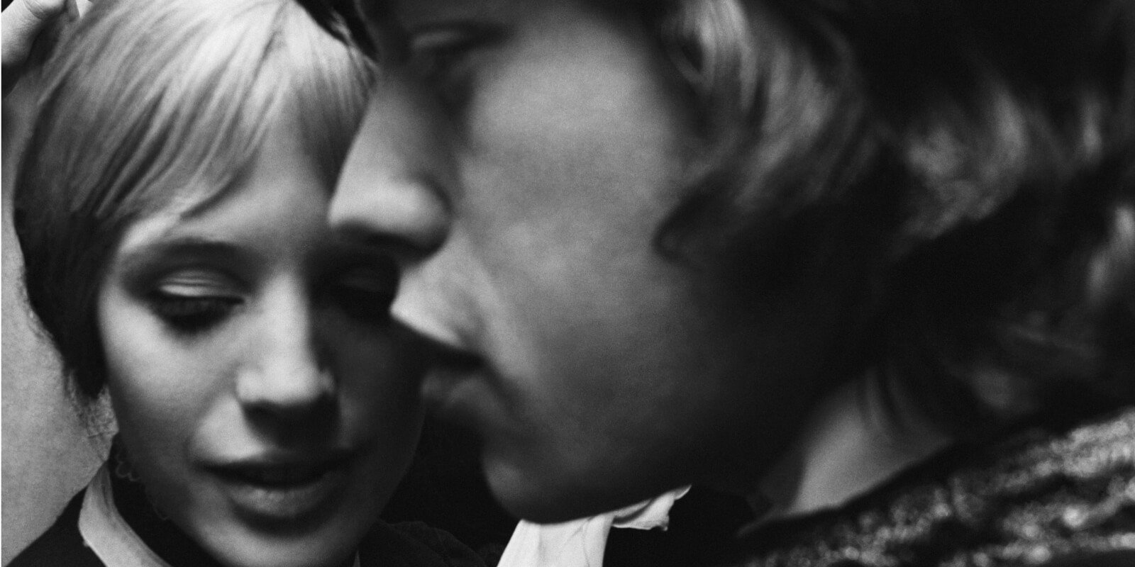 Marianne Faithfull and Mick Jagger in a black and white photo taken in April 1967.