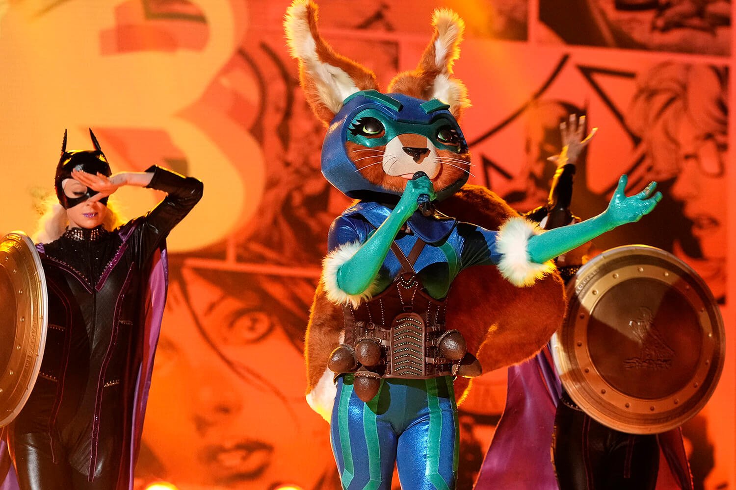 Squirrel performs on DC Superhero Night on The Masked Singer Season 9.