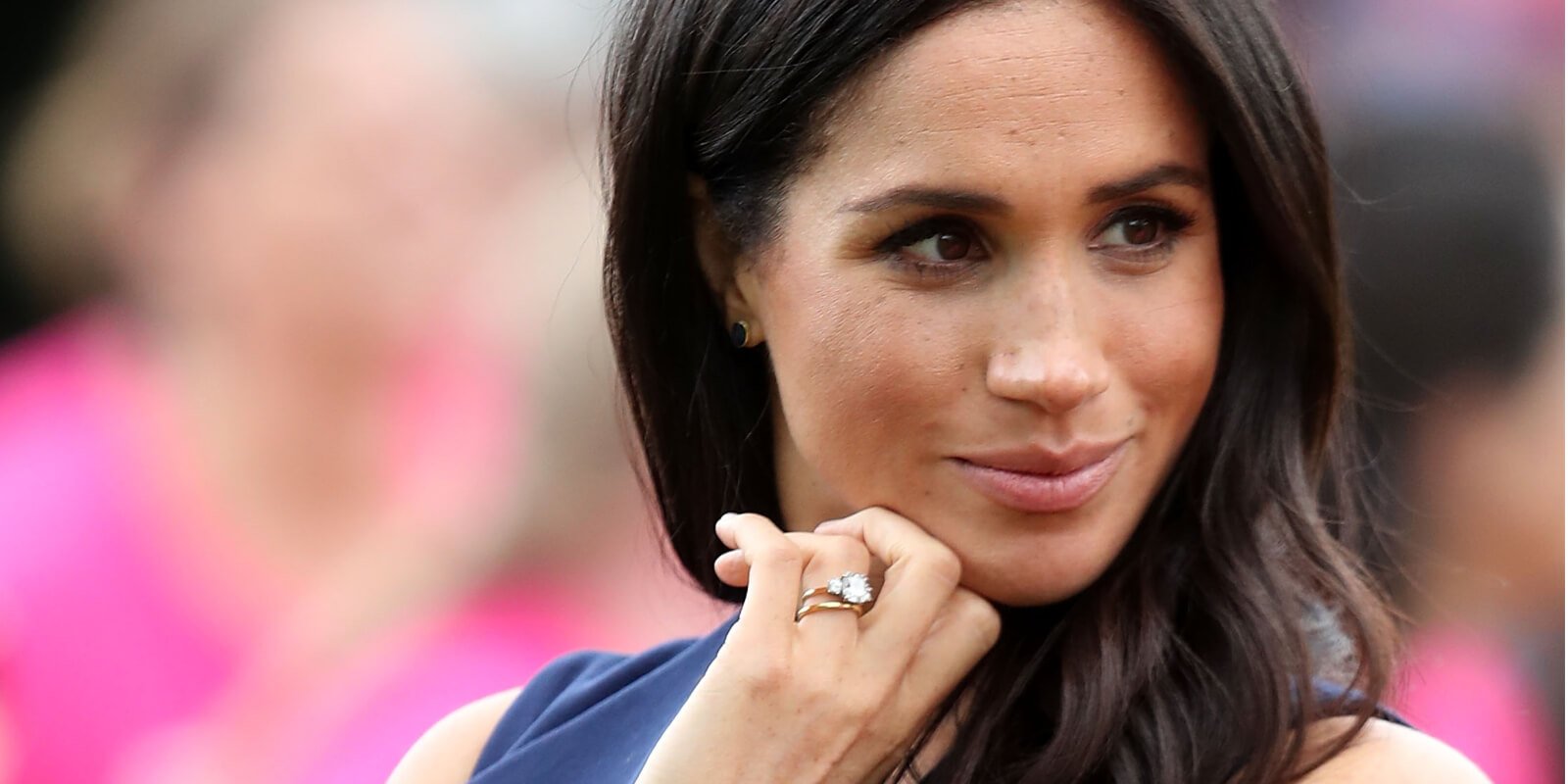 Meghan Markle looks away from the camera during an official royal event in 2018.