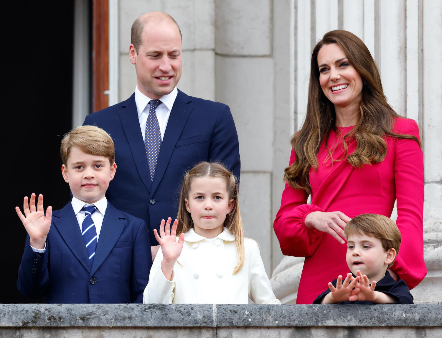 Prince William and Kate Middleton smile with their children Prince George, Princess Charlotte, and Prince Louis