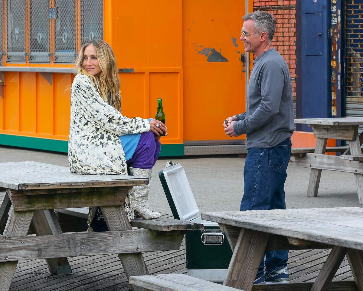 Sarah Jessica Parker as Carrie Bradshaw and David Eigenberg as Steve Brady film a scene for 'And Just Like That....' season 2 in Brooklyn.