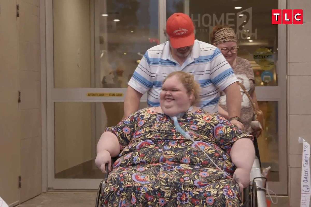 Tammy Slaton exits the hotel pushed by her brother Chris Combs just before her weight loss surgery