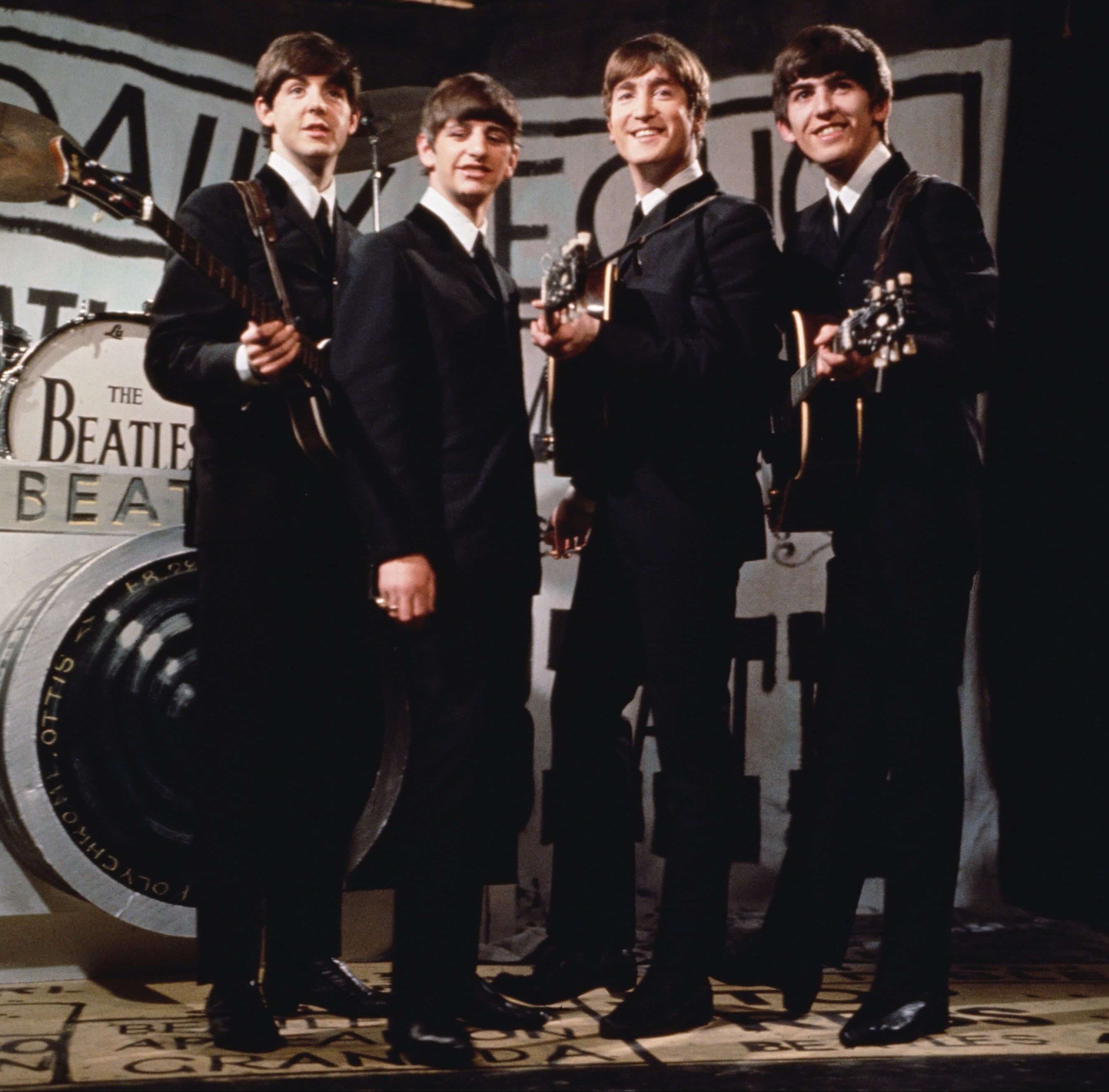 The Beatles in suits during the "She Loves You" era