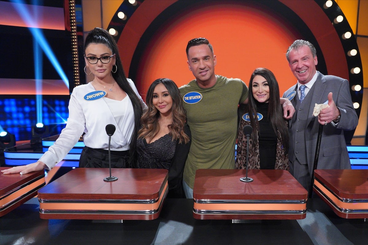The cast of 'Jersey Shore' including Jenni 'JWoww' Farley, Nicole 'Snooki' Polizzi, Mike 'The Situation' Sorrentino, Deena Cortese, and Uncle Nino on the set of 'Family Feud' where they faced off against the cast of 'The Hills' in 2020.