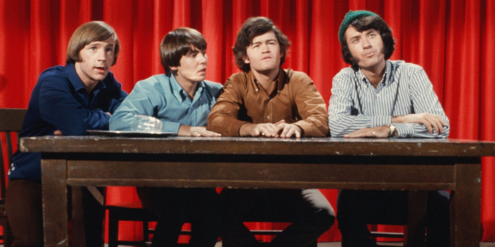 The Monkees on the set of the set of an episode of the television series title 'The Devil and Peter Tork.'