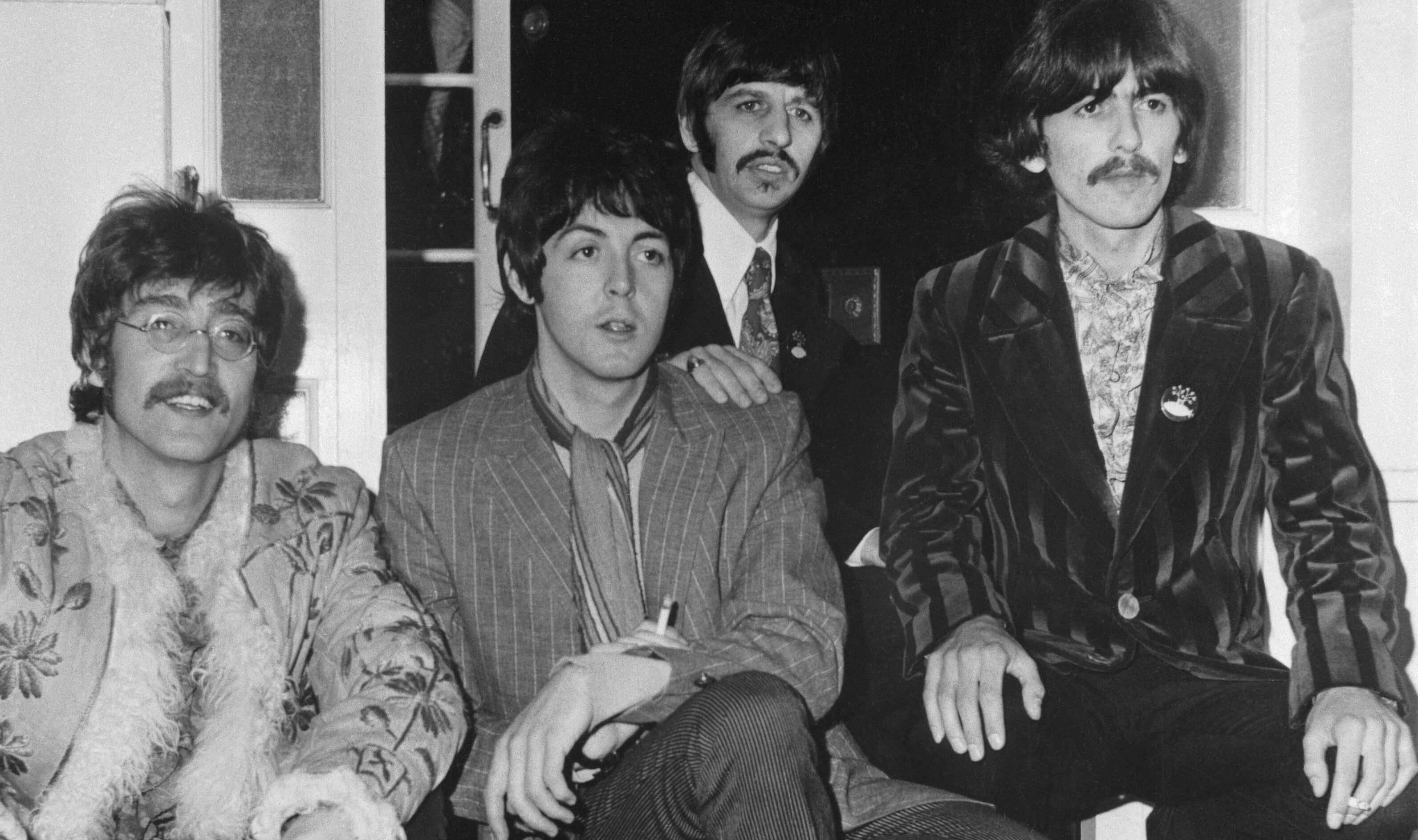 The Beatles in black-and-white during their psychedelic era