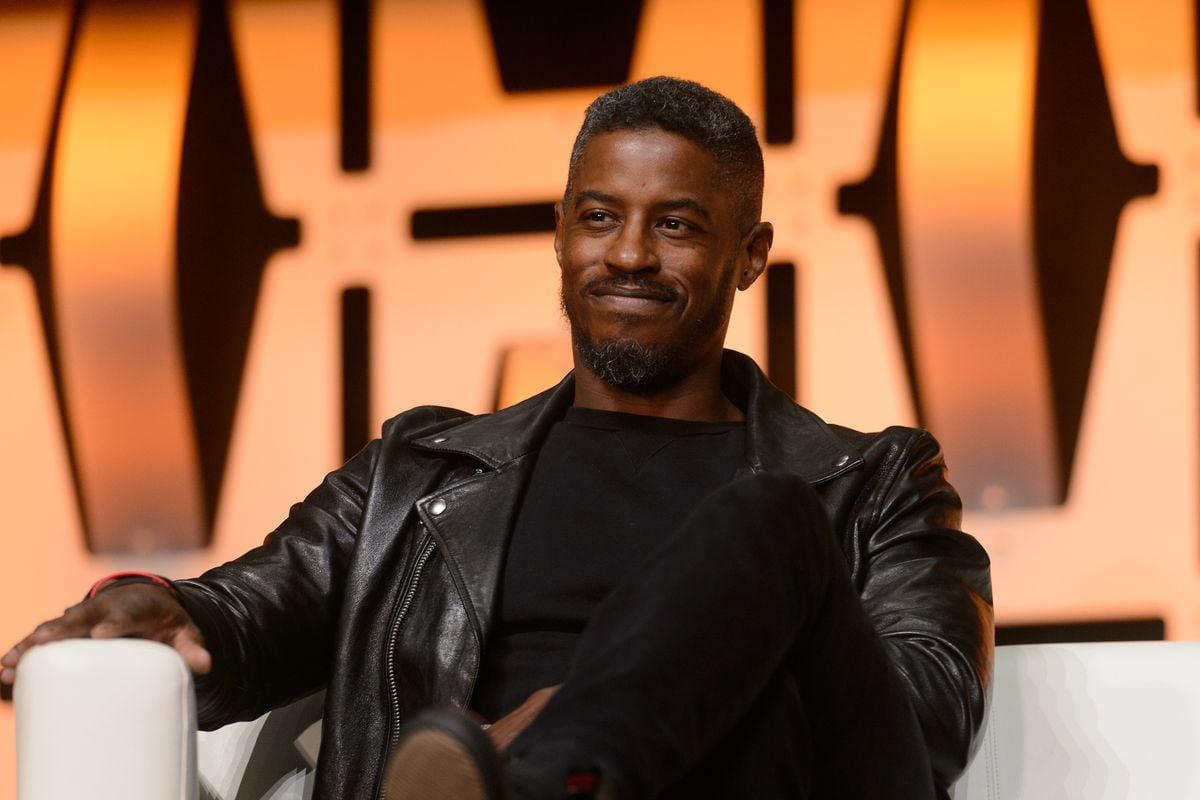 Ahmed Best appears onstage during a "Star Wars" fan event.